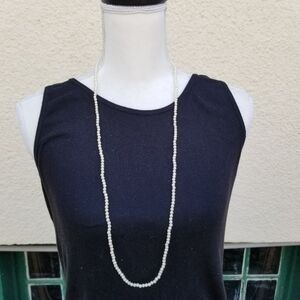 long single strand of faux pearls